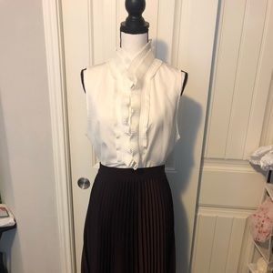 White sleeveless blouse